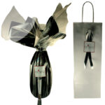Coffret cadeau "Fleur" & sac en papier avec logo & poignées pour transporter la bouteille.